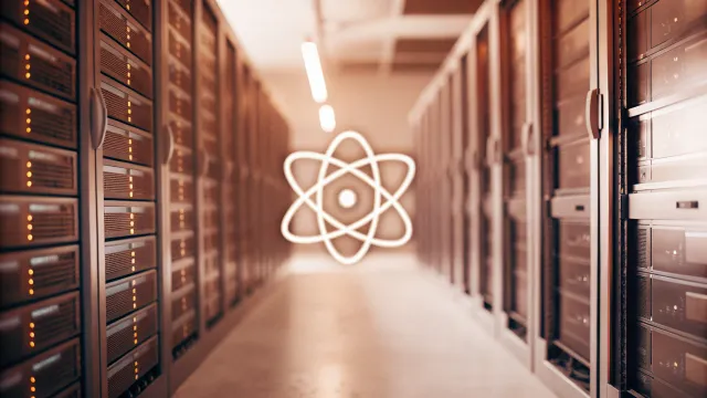 Laptop displaying code with React and Next.js logos, representing framework choice for web development.